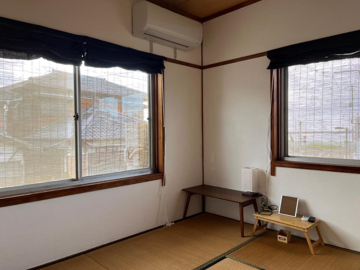 Guesthouse紫雲 Kanonji Exteriör bild