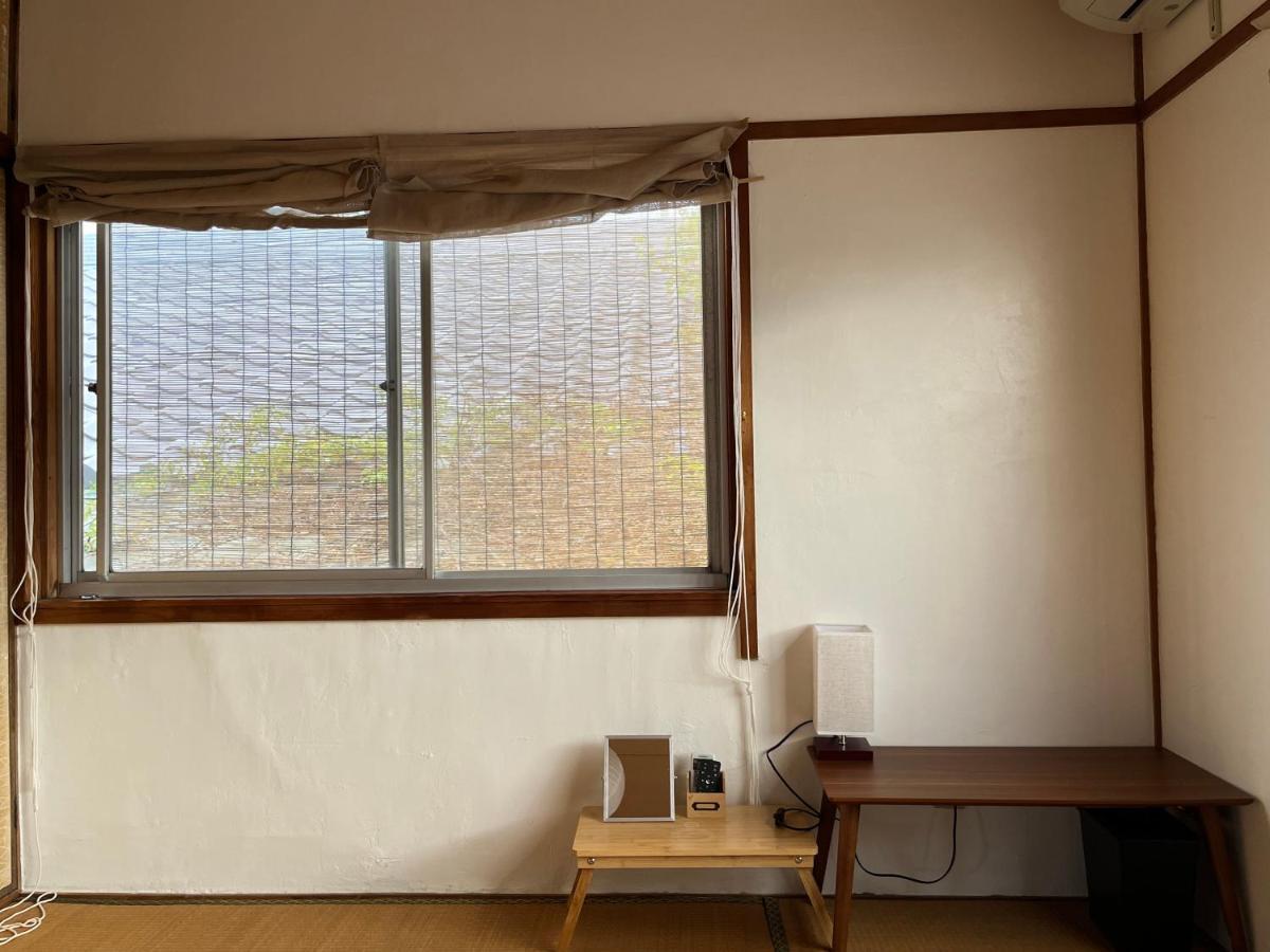 Guesthouse紫雲 Kanonji Exteriör bild